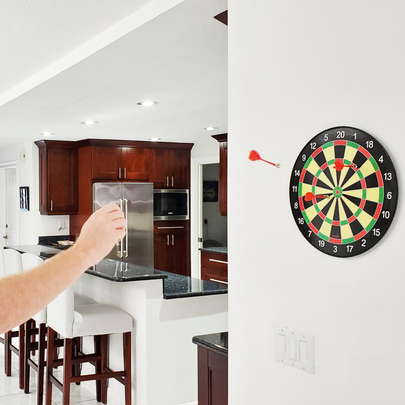 Playing Magnetic Darts in the living room