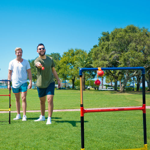 Friends playing hillbilly golf in the park having fun